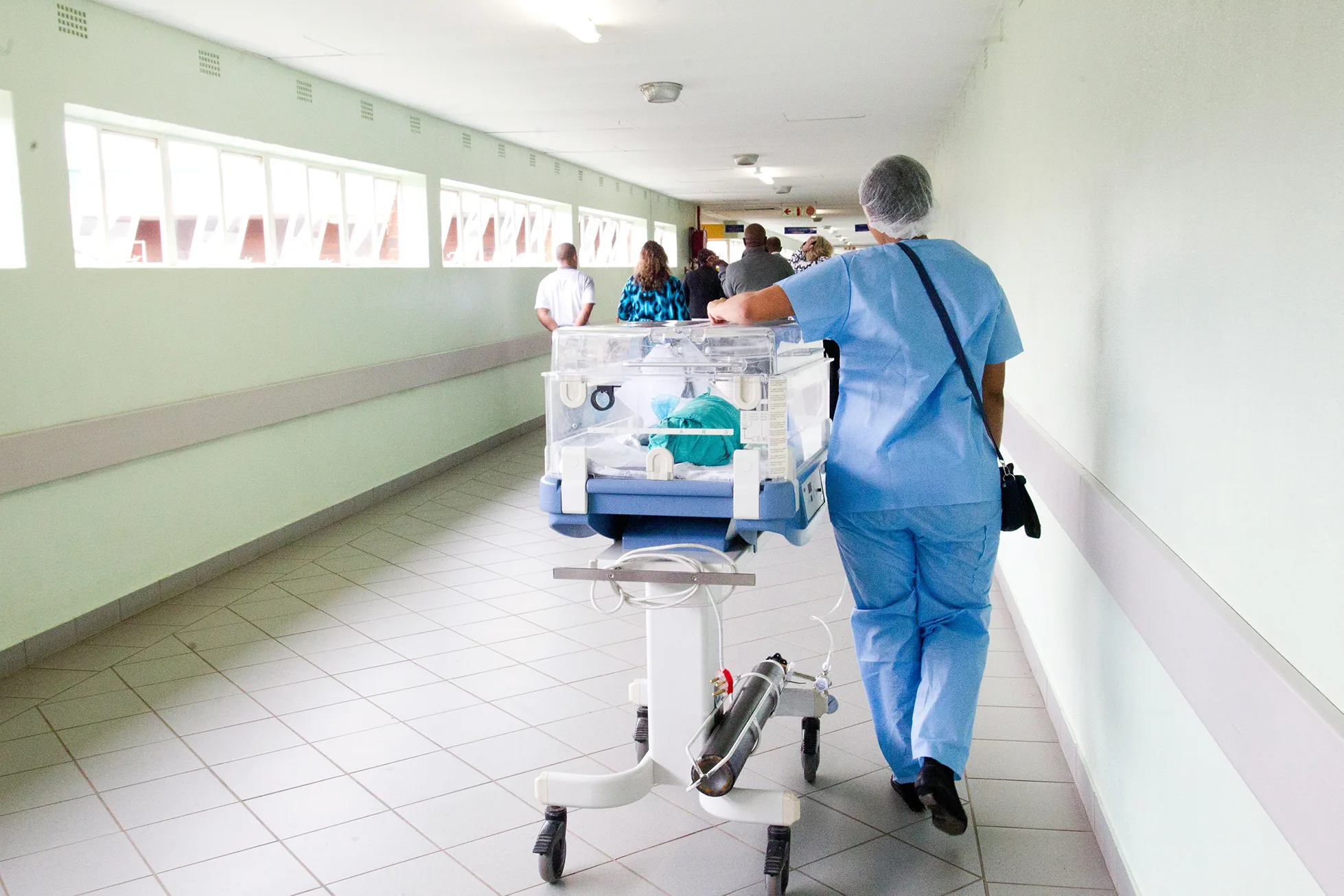 Dctors walking in hospital hallway